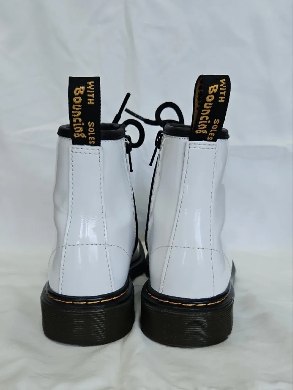 Dr. Martens White Patent Lace-Up Boots with Black Laces